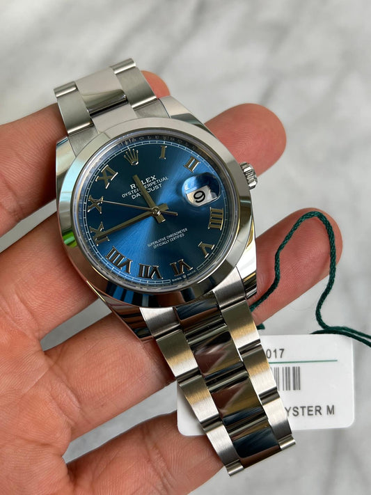 2024 126300 Oyster Blue Roman Preowned Good Complete w/ White Tag