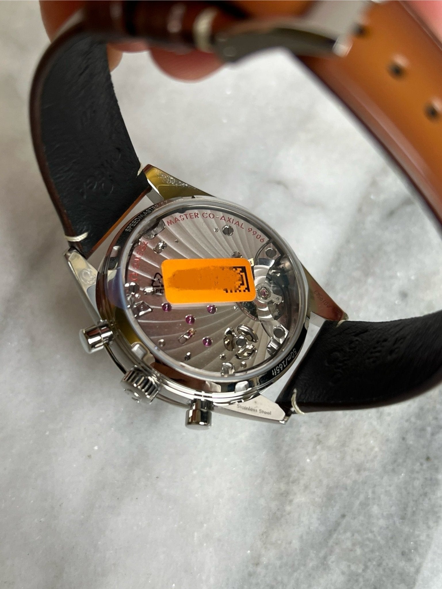 Omega 2025 33212415101001 Speedmaster SS Chronograph Black Dial on Brown Leather Strap New Complete 12487