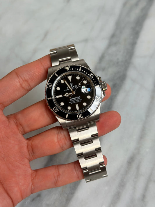 Rolex 2022 126610LN Sub Date Preowned and Polished Complete w/ White Tag 14635