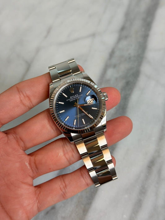 Rolex 2025 126234 Oyster Blue Index Preowned Good Complete 14593