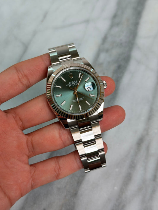 Rolex 2025 126334 Oyster Green Index Preowned and Polished Complete 14894