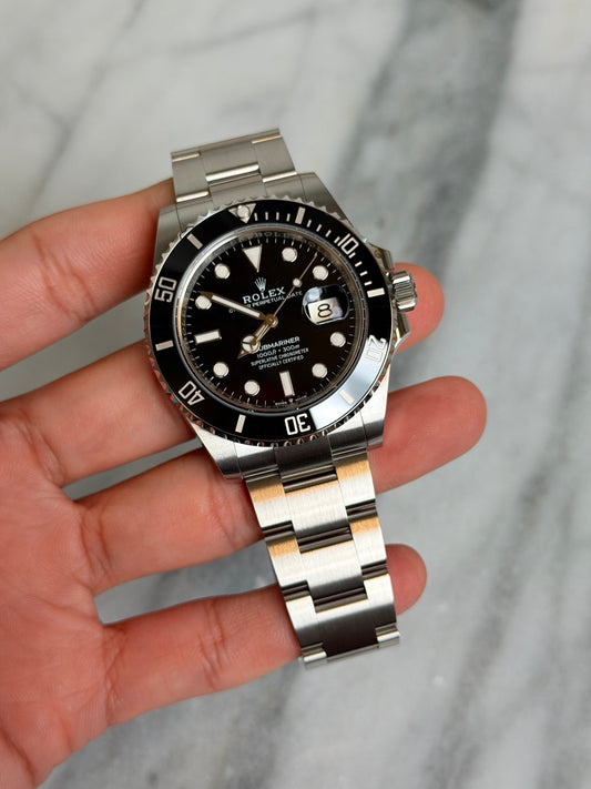 Rolex 2025 126610LN Sub Date Preowned and Polished Complete 14757